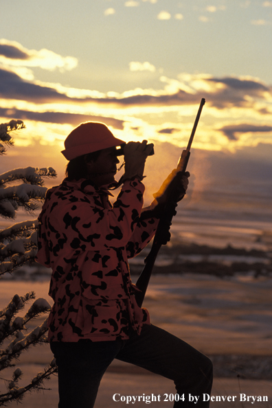 Big game hunter glassing.