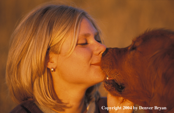 Woman with golden Retriever