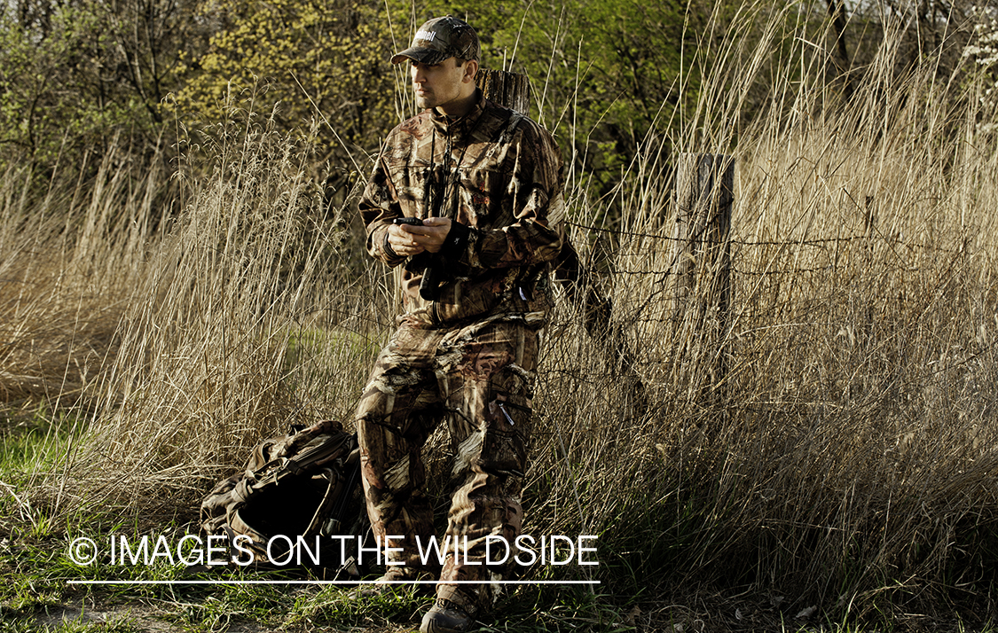 Bowhunter using GPS.