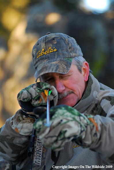 Bowhunter in Field