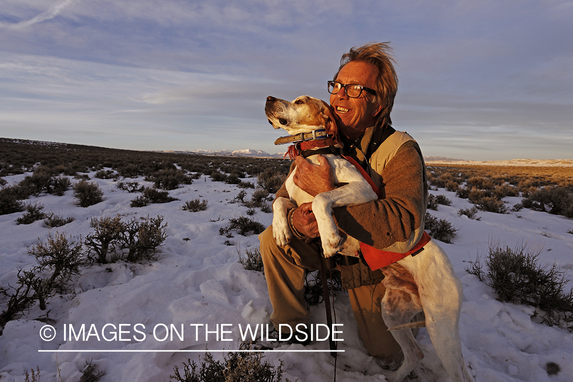 Falconer with english pointer.