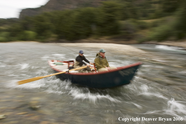 Flyfisherman in driftboat.