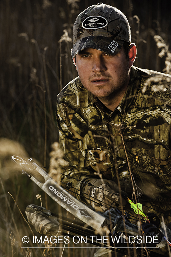 Bowhunter in field.