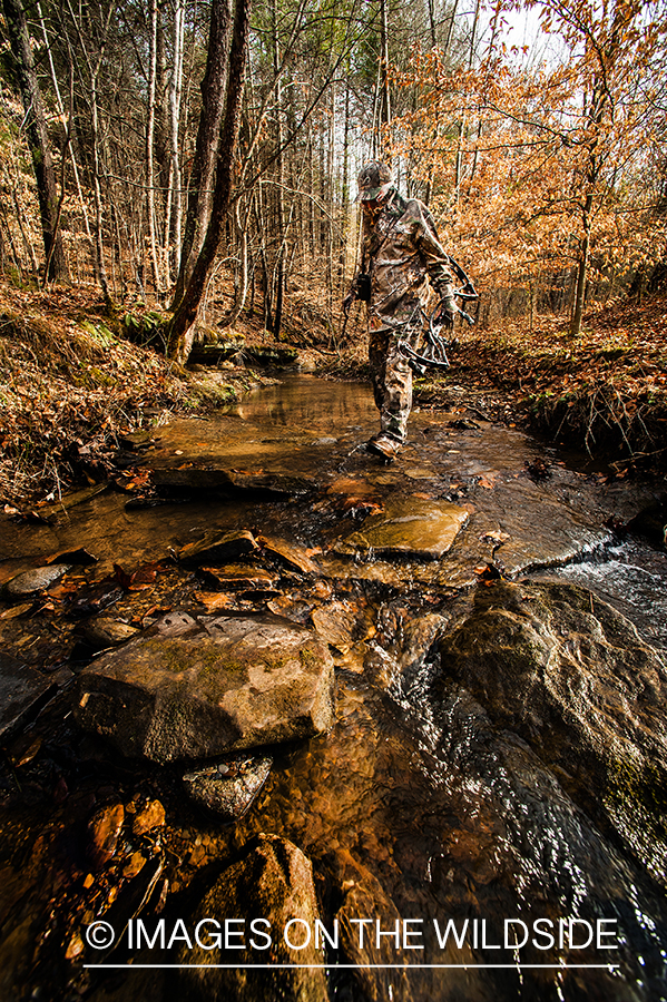 Bowhunter in field.