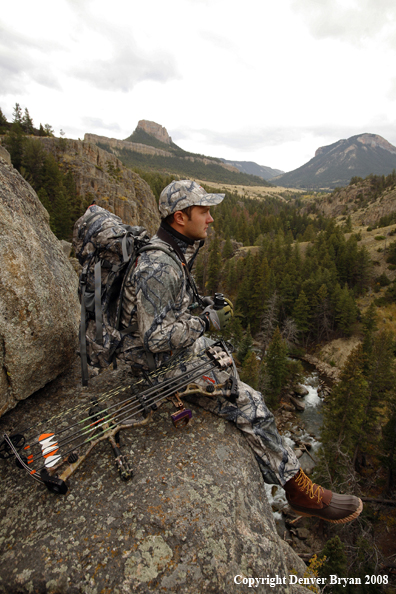 Bow Hunter Scouting Big Game