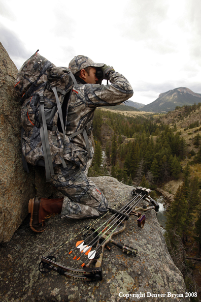 Bow Hunter Scouting For Big Game