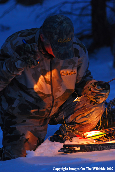 Bowhunter Following Blood Trail