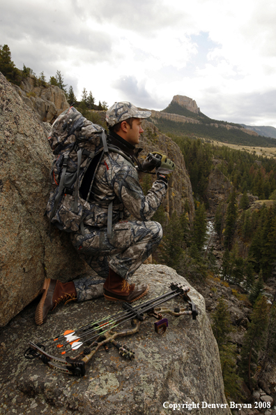 Bow Hunter Scouting For Big Game