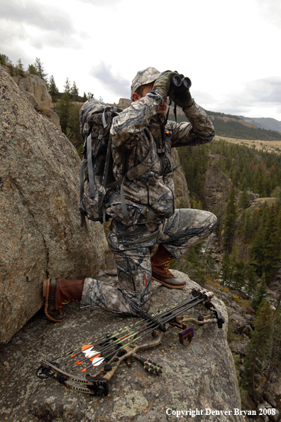 Bow Hunter Scouting For Big Game