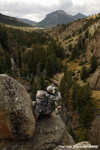 Bow Hunter Scouting For Big Game