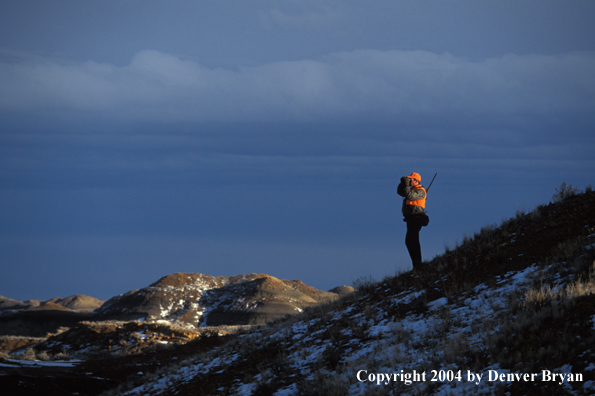 Big game hunter glassing.