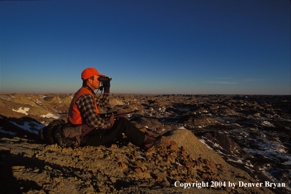 Big game hunter glassing.