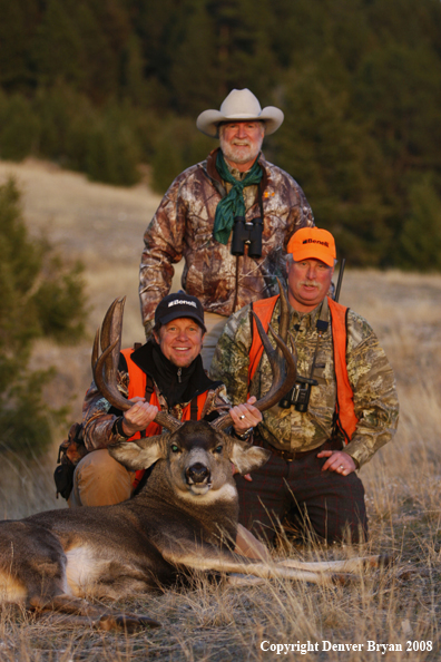Hunters with Mule Deer