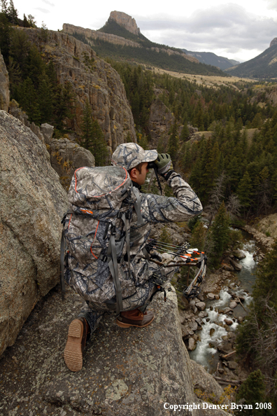 Bow Hunter Scouting For Big Game