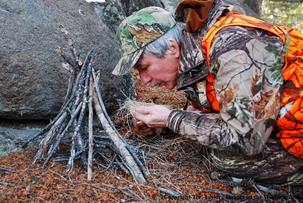 Big Game hunter starting fire