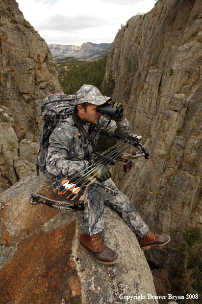 Bow Hunter Scouting For Big Game