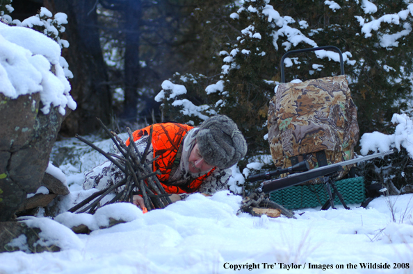 Big Game hunter starting fire