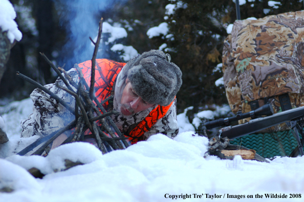 Big Game hunter starting fire