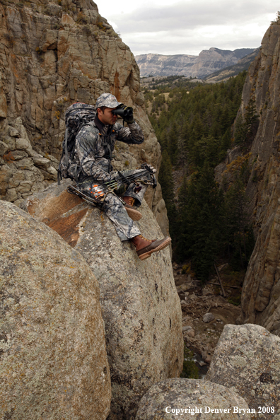 Bow Hunter Scouting For Big Game