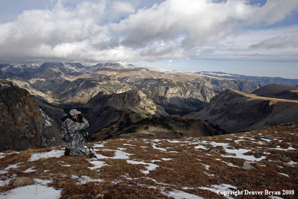Bow Hunter scouting for big game on Beartooth Pass