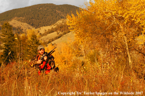 Big game hunter in field