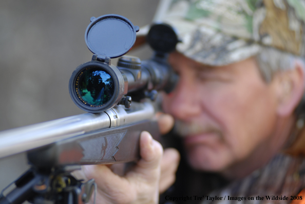 Hunter sighting in gun