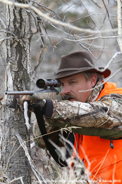 Hunter scouting for white-tailed deer. 