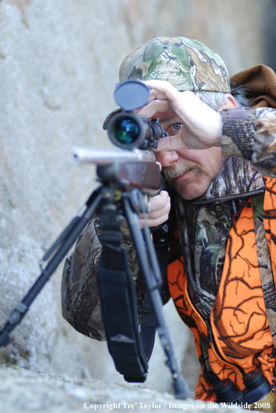 Hunter sighting in gun