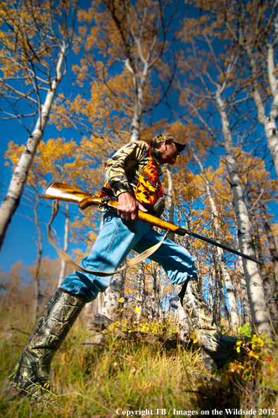 Big game hunter running. 