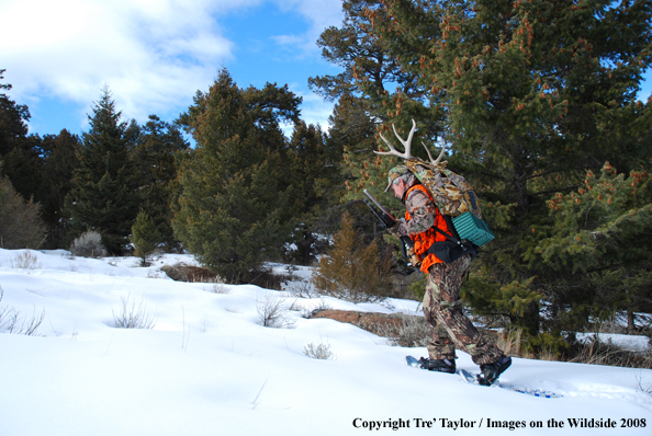 Hunter snowshoeing