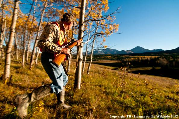 Big game hunter running. 