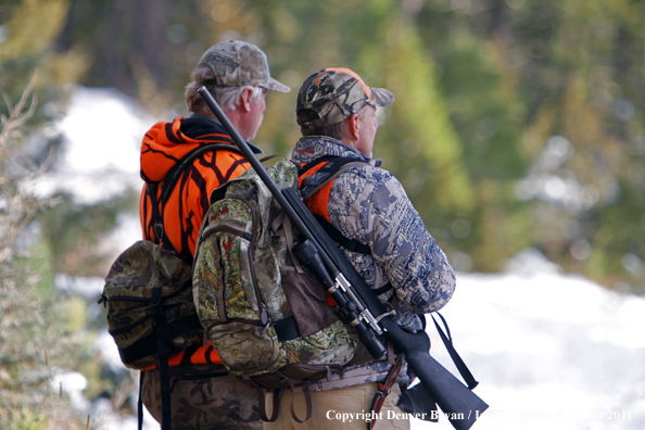 Big game hunters glassing for elk.